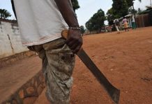 Man hacked to death in machete attack as mine dispute turns deadly