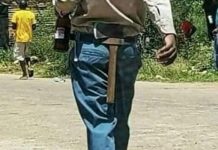 Drunk man causes a scene during soccer tournament, runs amok and destroys vending stalls with an axe