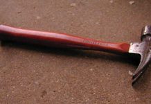 Woman arrested after bashing husband on the face with hammer