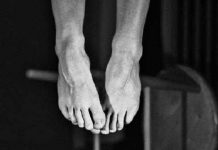 Horror as jealous man hangs self after striking wife with machete