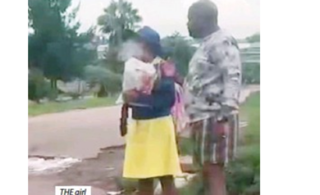Video of girl smoking mbanje with a ‘drug dealer’ while on way to school causes stir (WATCH VIDEO)
