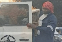 Chaos in Harare as man sits on top of car in the middle of the road shouting ‘Nehanda has risen!’