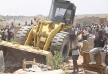 Bulldozer driver makes sh0cking discovery while levelling a huge pile of garbage at dumpsite