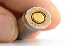 Malaysian woman in trouble after being found with live 9mm round of ammunition at Vic Falls airport