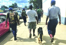 Tense atmosphere at court as killer Peter Dube arrives under heavy police guard