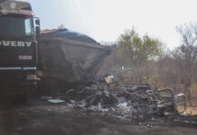 2 haulage trucks collide head-on and catch fire at midnight, driver burnt beyond recognition (SEE PICS)