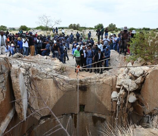Hundreds of trapped Zim miners send SOS from a South African mine, held hostage by 10 heavily armed men underground: 33 live and 1 dead emerge