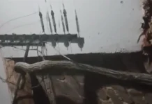 Ghetto family accused of witchcraft, leaves in fear as huge python appears on their roof every night at 7pm (WATCH VIDEO)
