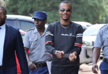 Detective Kedha Tafadzwa Chidawa cries uncontrollably in court as ‘cleaning US$100,000’ goes wrong, magistrate remands him in custody