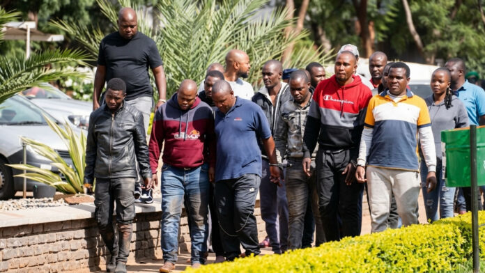 arrested armed robbers appearing at court