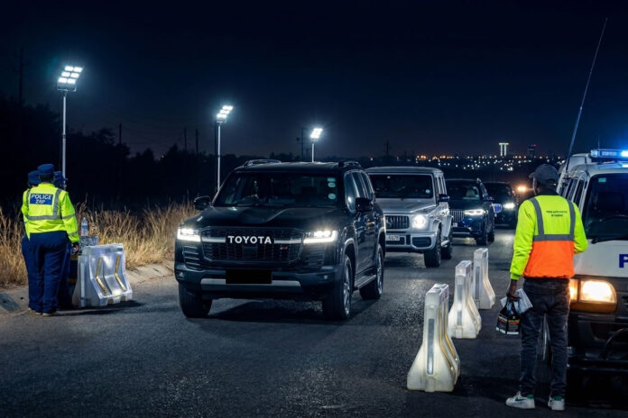 zrp police road block at night - luxury cars