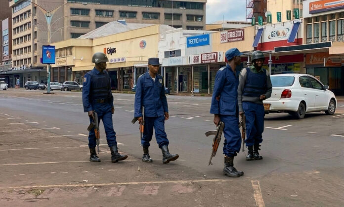 police officers carrying ak-47 guns in Bulawayo CBD