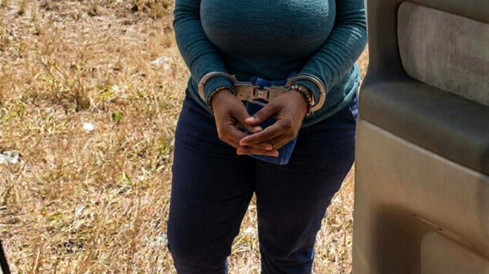 woman arrested car handcuffed
